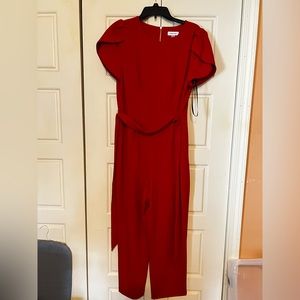 Red Calvin Klein jumpsuit.